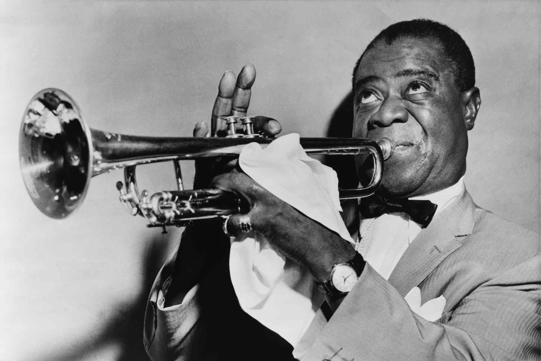 Louis Armstrong Playing trumpet - Havana Music Tours Website Photos