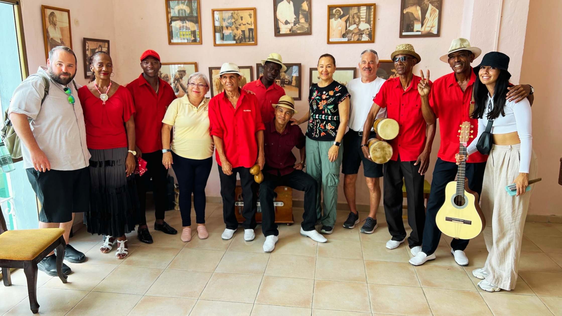 Musicians and visitors with guitar and percussion in Guantánamo, Cuba.